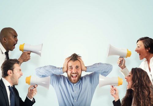 Stress concept with colleagues who screams to businessman